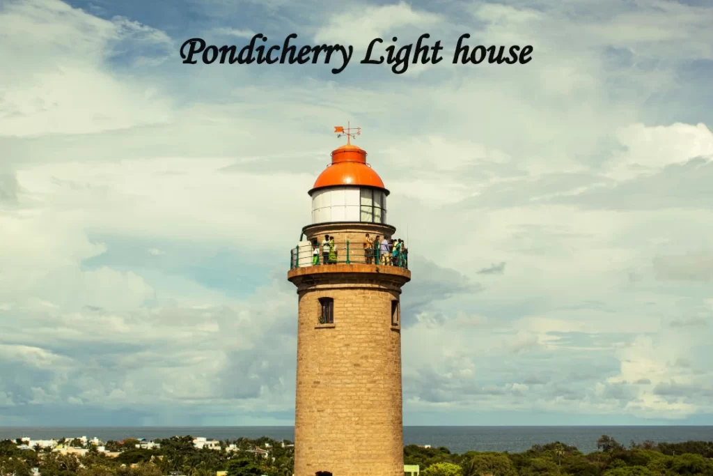 The towering black-and-white striped New Pondicherry Lighthouse near the coast—a fantastic viewpoint to visit in TamilNadu.