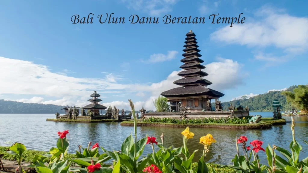Ulun Danu Beratan Temple rising from Lake Beratan in Bali, surrounded by tropical flowers — a iconic destination wedding backdrop in Asia