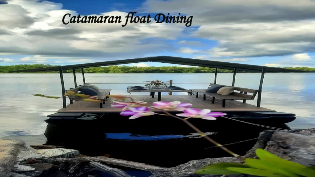 A scenic catamaran float dining setup on the river, representing unique water-based restaurants near Bentota with covered outdoor seating.