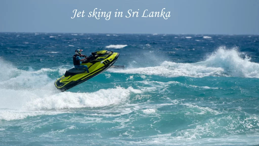 An adventurous rider leaping over ocean waves on a bright yellow jet ski, showcasing thrilling water sports in Sri Lanka.