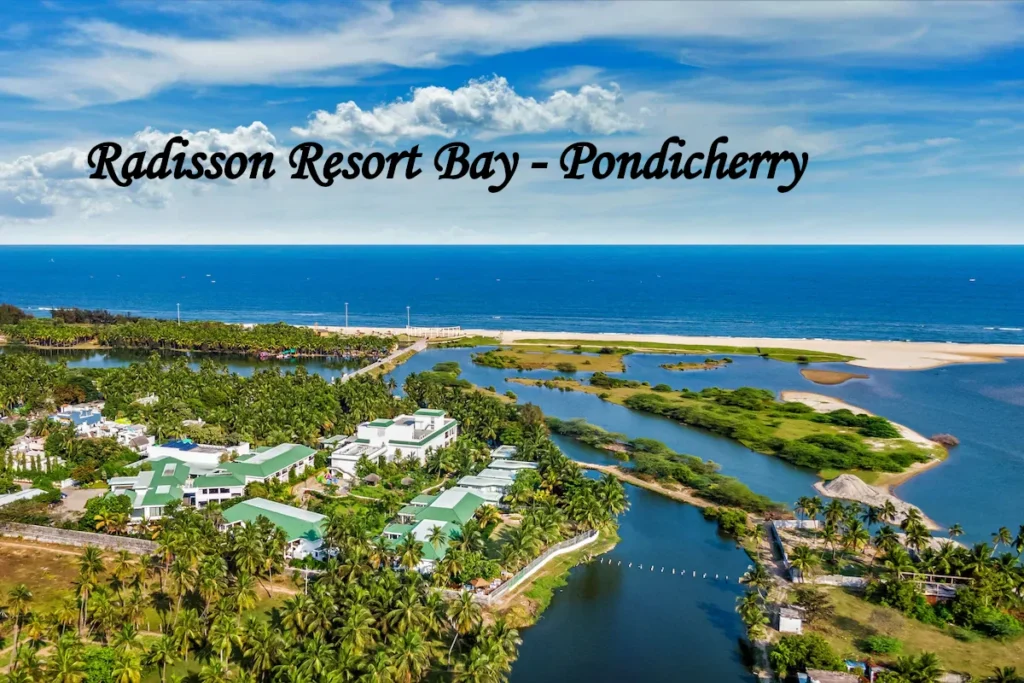 Aerial view of Radisson Resort Pondicherry Bay next to scenic backwaters and the ocean, a luxury stay option near top places to visit in Pondicherry