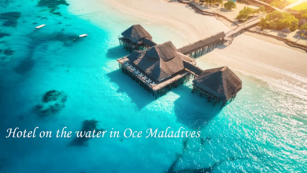 Aerial view of overwater bungalows in the Maldives — a top destination wedding location in Asia