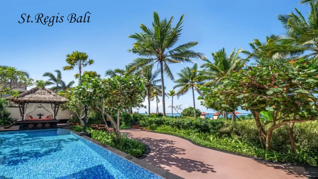 A luxury private pool villa at the St. Regis Resort, surrounded by lush tropical gardens and palm trees, showcasing premium places to visit in Bali for a destination wedding.