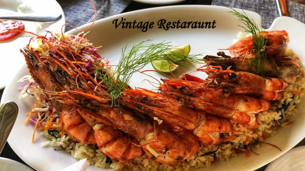 A delicious platter of grilled giant prawns served over fried rice at Vintage Restaurant, one of the top-rated restaurants near Bentota.