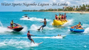 Tourists enjoying jet skiing, water skiing, banana boat ride, and tube ride on the Negombo Lagoon in Sri Lanka