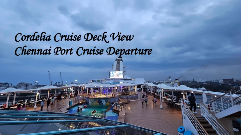 Passengers relaxing on the open pool deck of a Cordelia luxury liner as it prepares to depart from the Chennai Port Cruise terminal. Passengers relaxing on deck during a Chennai cruise departure