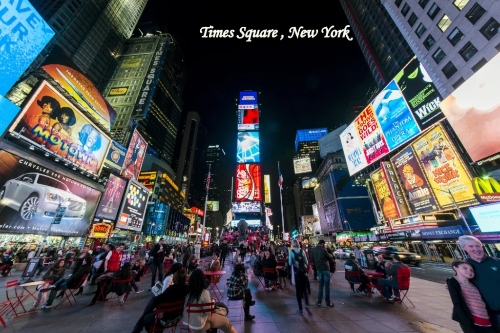 New York City Attraction  Times Square illuminated with digital billboards at night in New York City