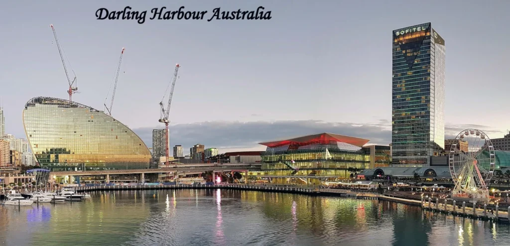 Darling Harbour panorama in Sydney, Australia, featuring the vibrant waterfront, skyline, and one of the top attractions in the cities to visit in Australia.