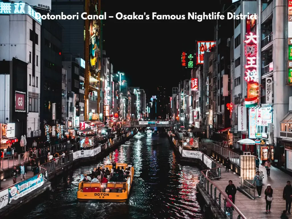 Osaka tourist places Dotonbori canal at night with neon lights