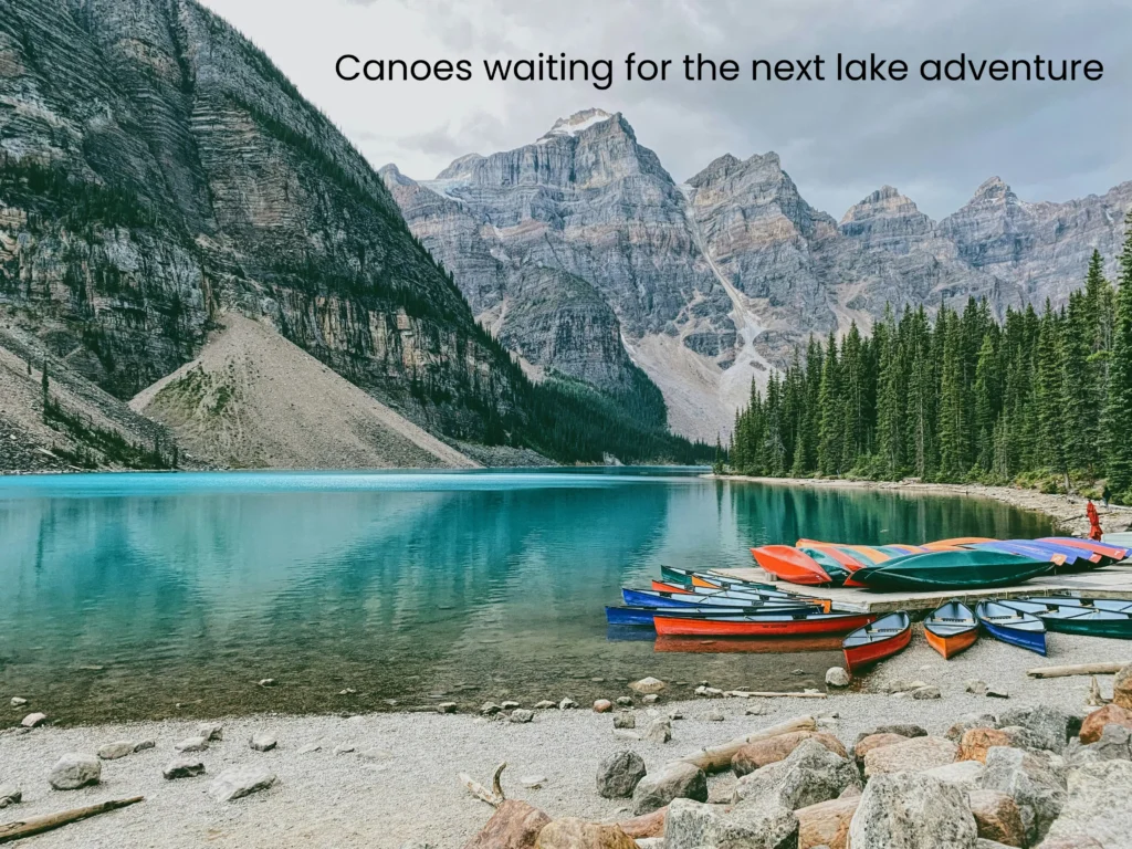 Banff National Park travel guide canoes on the shore of Moraine Lake